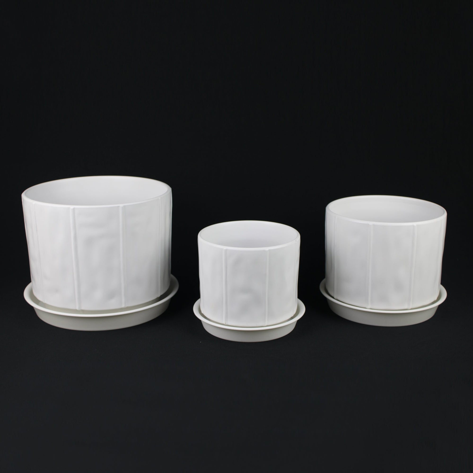 3-Piece White Stoneware Planter Pot Set with Soft Vertical Texture