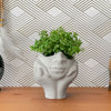 Face Succulent Planter on Two Hands